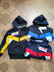 Двосторонні куртки-вітрівки.