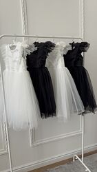 Святкові сукні у білому і чорному кольорах