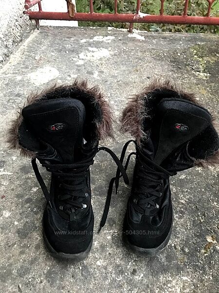 Високі зимові черевики - взуття з хутром