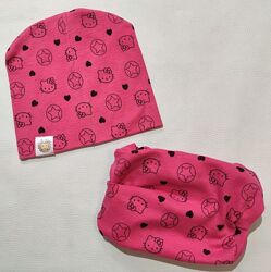 Рожевий комплект шапка та снуд для дівчинки