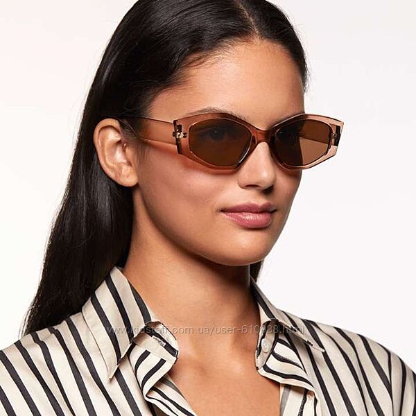 Жіночі сонцезахисні окуляри у фігурній оправі