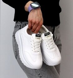 Жіночі кросівки білого кольору 23,5 см