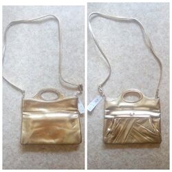 Новая золотистая сумка-клатч трансформер двусторонняя. Яркая, стильная.