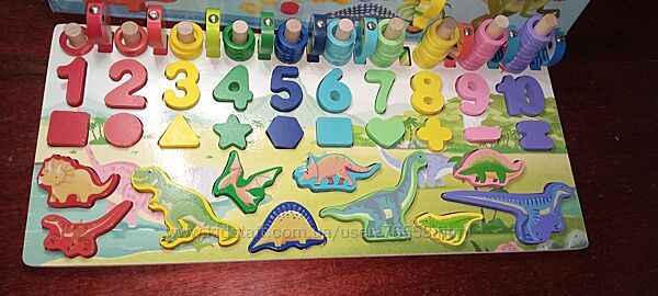 Деревяна гра сортер динозаври рибалка.