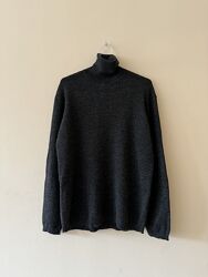 Шерстяная водолазка в рубчик Uniqlo