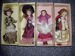 Фарфоровые коллекционные куклы новые в коробках