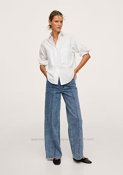 Нові жіночі джинси mango широкі