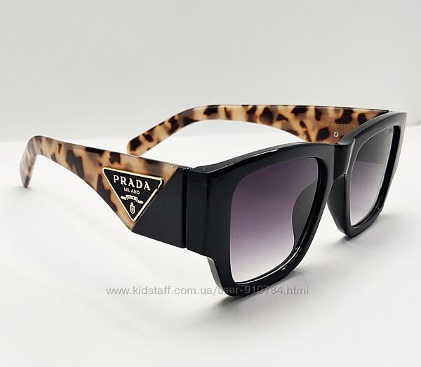 Жіночі окуляри сонцезахисні із леопардовими широкими дужками