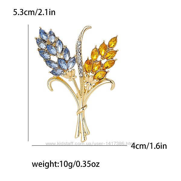 Брошки в ассортименті 