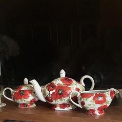 Англійський сет - чайник, молочник, цукорниця та блюдо з лопаточуою