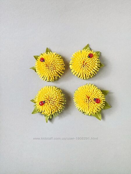 Яскраві резиночки для волосся з кульбабками.