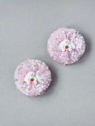 Легкі, повітряні, світло рожеві бантики.