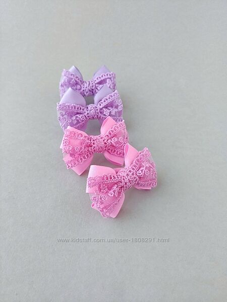 Бантики з мереживом модний аксесуар для маленької красуні.