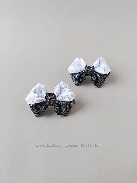 Елегантні бантики для волосся у класичному чорно-білому кольорі.