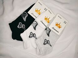Жіночі шкарпетки з метеликами 